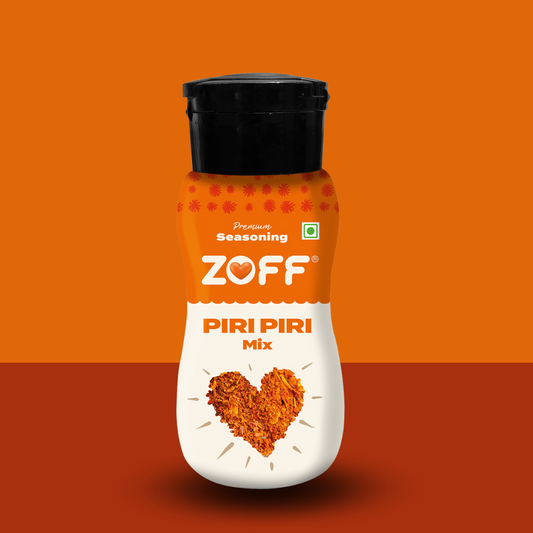 A bottle of ZOFF Piri Piri Mix seasoning with a predominantly orange label on an orange background.