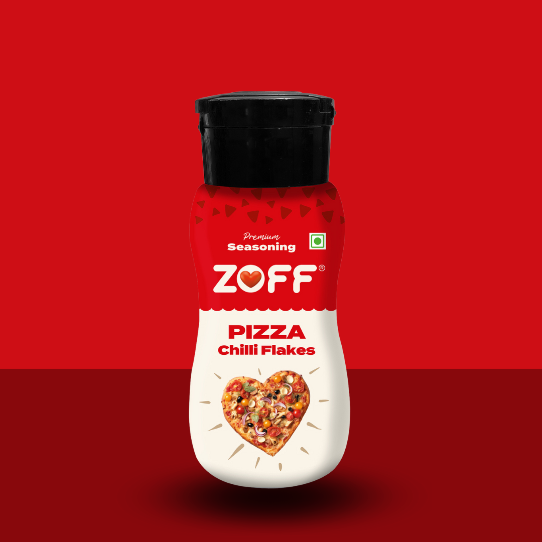 A bottle of ZOFF Pizza Chilli Flakes seasoning on a red background.