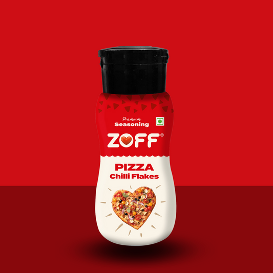 A bottle of ZOFF Pizza Chilli Flakes seasoning on a red background.